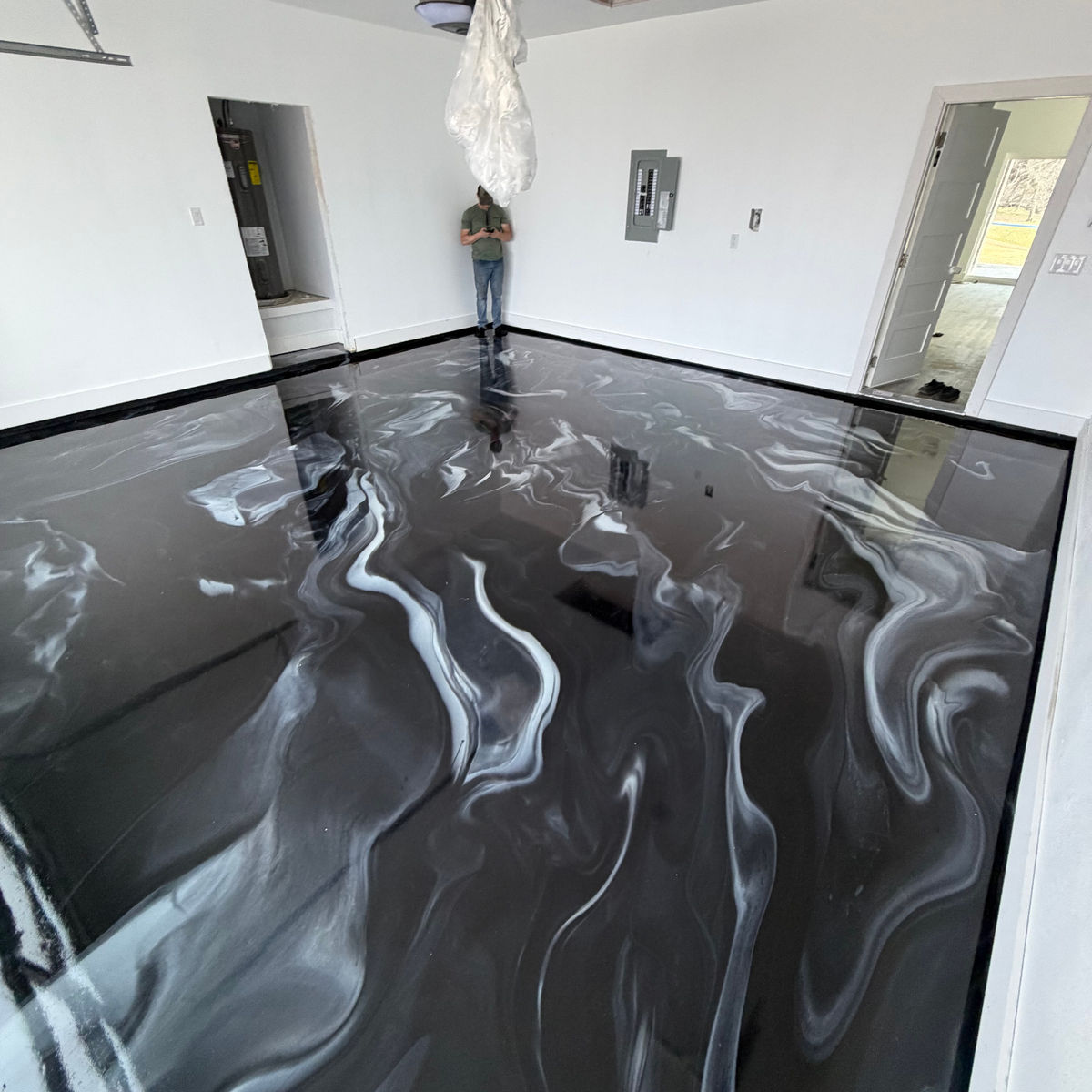 Black and white metallic epoxy floor