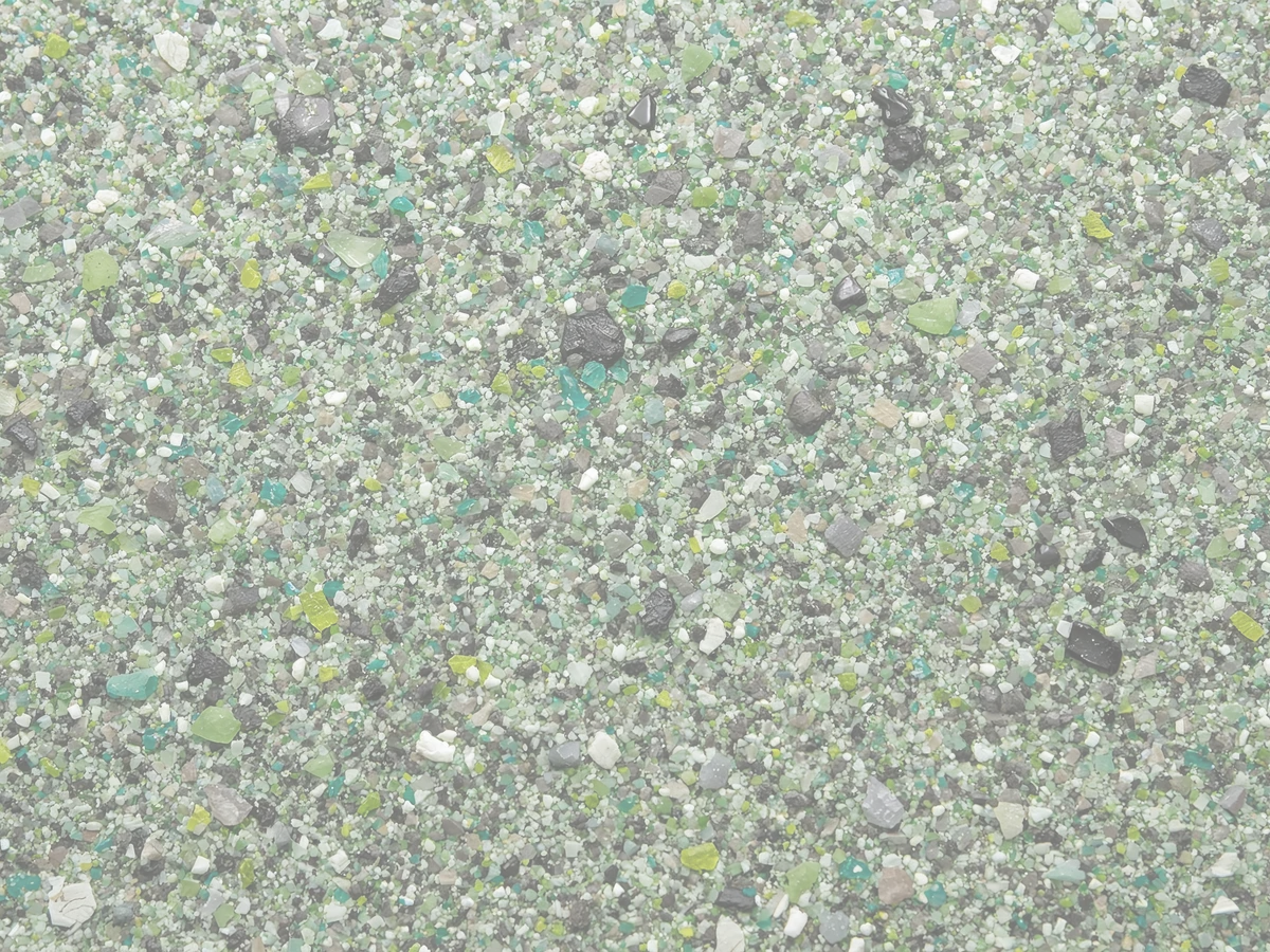 Close detail of a green and gray quartz flooring blend
